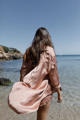 Relaxed fit button-up shirt with curved hem