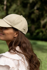 A detail of a back of Cove. cap in sand colour