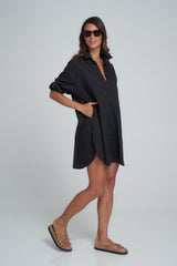 a women wearing dali black shirt dress by lilya