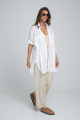 A Model Wearing a Classic White Cotton Layered Shirt Dress