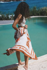 girl wearing sarong with floral print