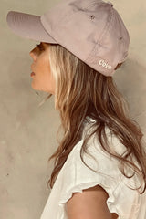 The detail of a Cove. back logo in pale pink new colour