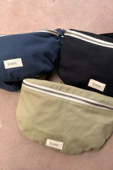 a close up look of cross body bag by cove island essentials