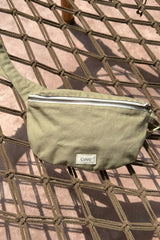 cove. island essentials cross body bag in khaki color