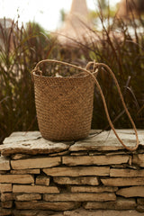 Rattan rope bag on the stone in Sumba