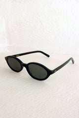 Side view of black sunglasses by Maison Mata