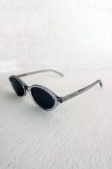 Side view of grey sunglasses by Maison Mata