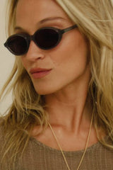 Black sunglasses of Cove and Maison Mata