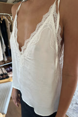 Ivory camisole with deep V-neckline