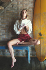 LILYA Peregian Shorts in Merlot Red satin viscose.