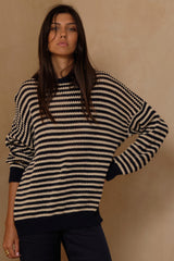 Lightweight cotton knit designed for layering across seasons