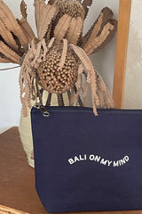 A close up of Bali On My Mind Pouch in navy colour Cove. x We Like Bali The Label.