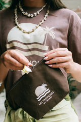 a woman holding a chocolate pouch by We Like Bali