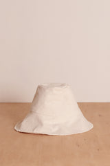 Ivory bucket hat by cove. island essentials