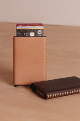 Leather push wallet card holder by Cove