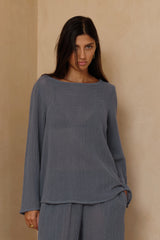 Allegra Storm Blue top showing wide rounded neckline and flared sleeves