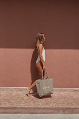 island tote bag by cove. island essentials in moss green color