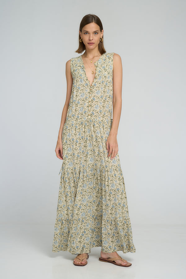 Model wearing Calvi Dress Fleur Des Champs, relaxed sleeveless maxi dress.