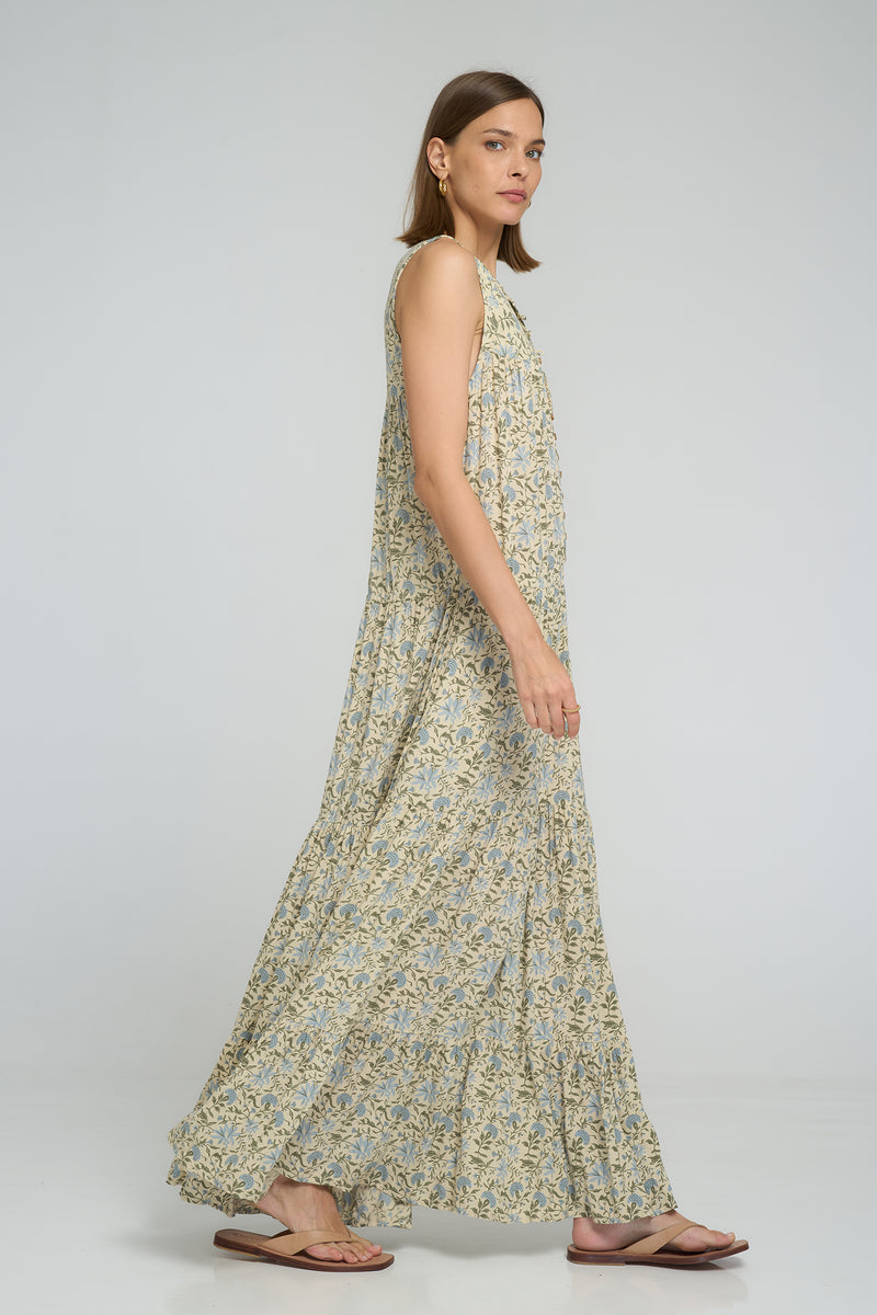 Side view of Calvi Dress showing adjustable waist ties for custom fit