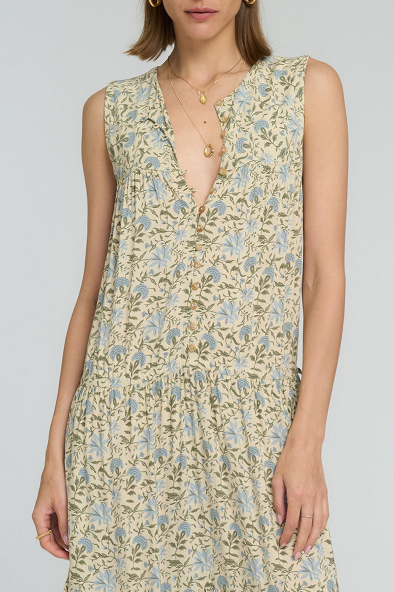 Calvi Dress front view showing V-neckline and floral print detail
