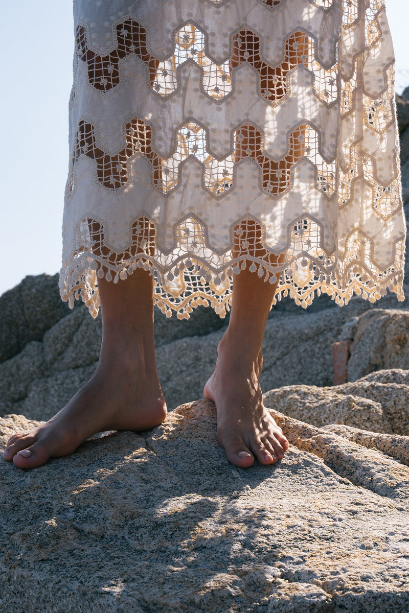 Detail of the lace norfolk strapless lace dress by Lilya