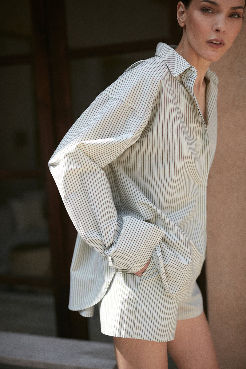 A model wearing striped summer shorts in Australia