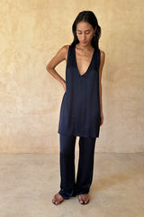 Model wears the satin silky navy set by LILYA, for day to night styling.