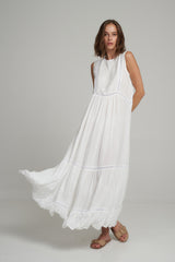  A Model Wearing a White Cotton Maxi Dress with Lace Detail