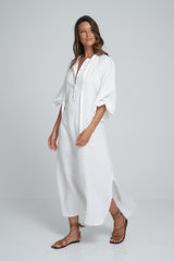 A Woman Wearing a White Linen Maxi Shirt Dress