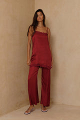 LILYA Essentia Pants in Merlot Red for day-to-night dressing.