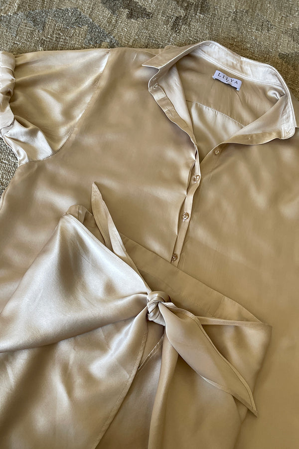 Detail of a taupe silk shirt in Taupe by Lilya