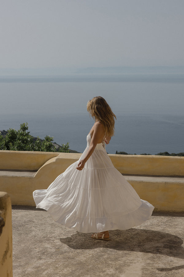 A Woman Wearing a White cotton Backless Maxi Dress in Australia