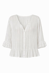 Ghost image showing the details of the white summer blouse by LILYA.