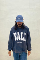 A men wearing Bali On My Mind Caps in Navy colour by We Like Bali The Label