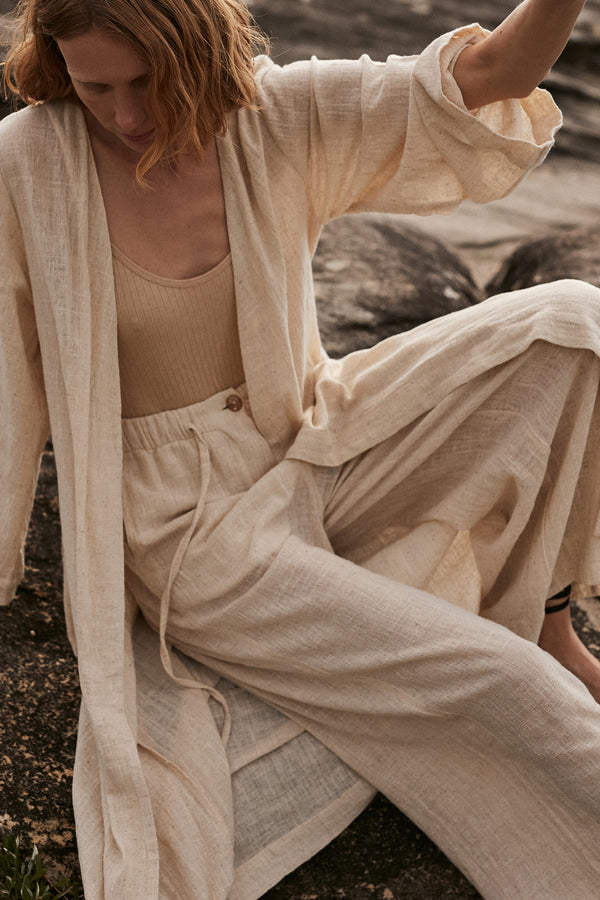 A Model Wearing Loose Natural Linen Pants in Australia