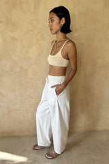 Front view of the Coconut Pants in Coconut Ivory featuring lightweight Meridian cotton and a relaxed pull-on design.