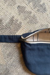 details of cross body bag by cove. in navy color 