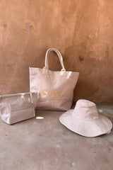 dusty rose color of  island cove. tote bag 