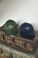 navy and green caps by LILYA