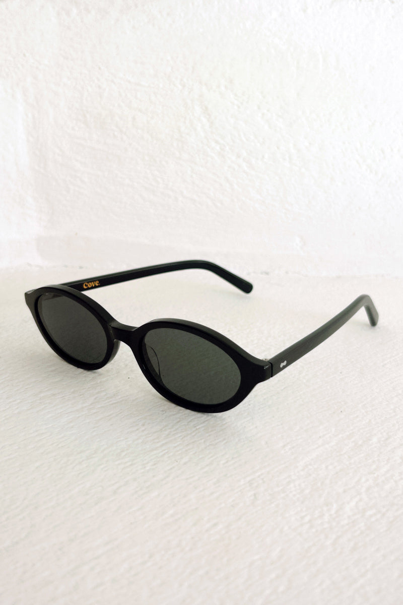 Side view of black sunglasses by Maison Mata 
