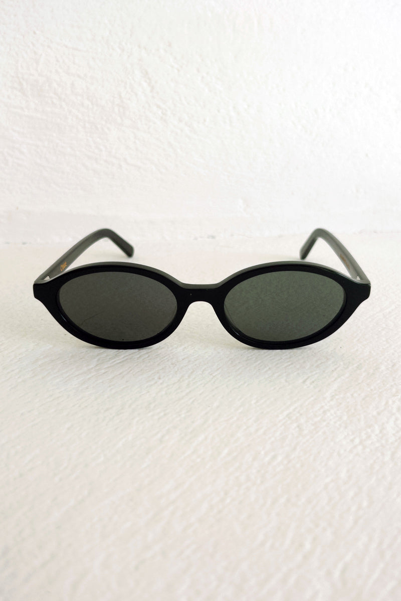 Front view of black sunglasses by Maison Mata 