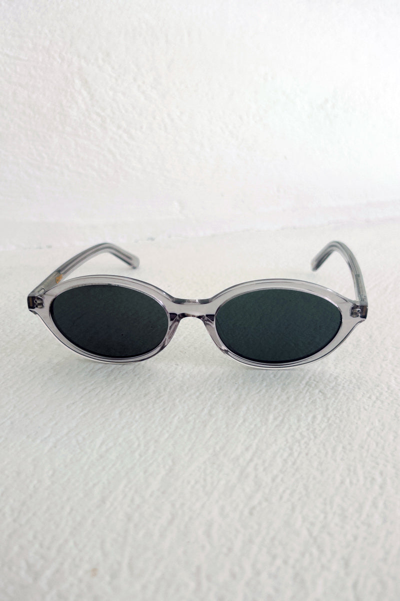 Front view of grey sunglasses by Maison Mata 