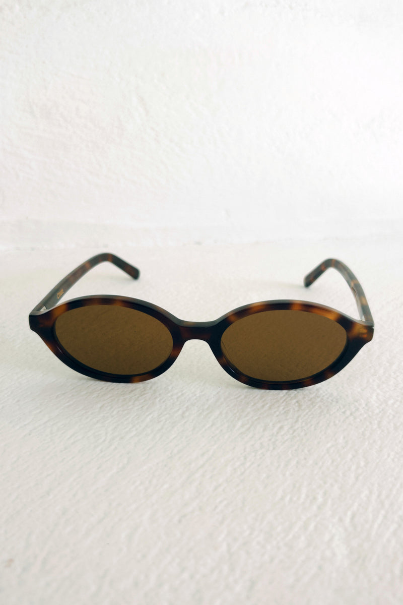 Front view of tortoiseshell sunglasses by Maison Mata 