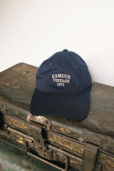 Front view of baseball style cap with embroidered logo