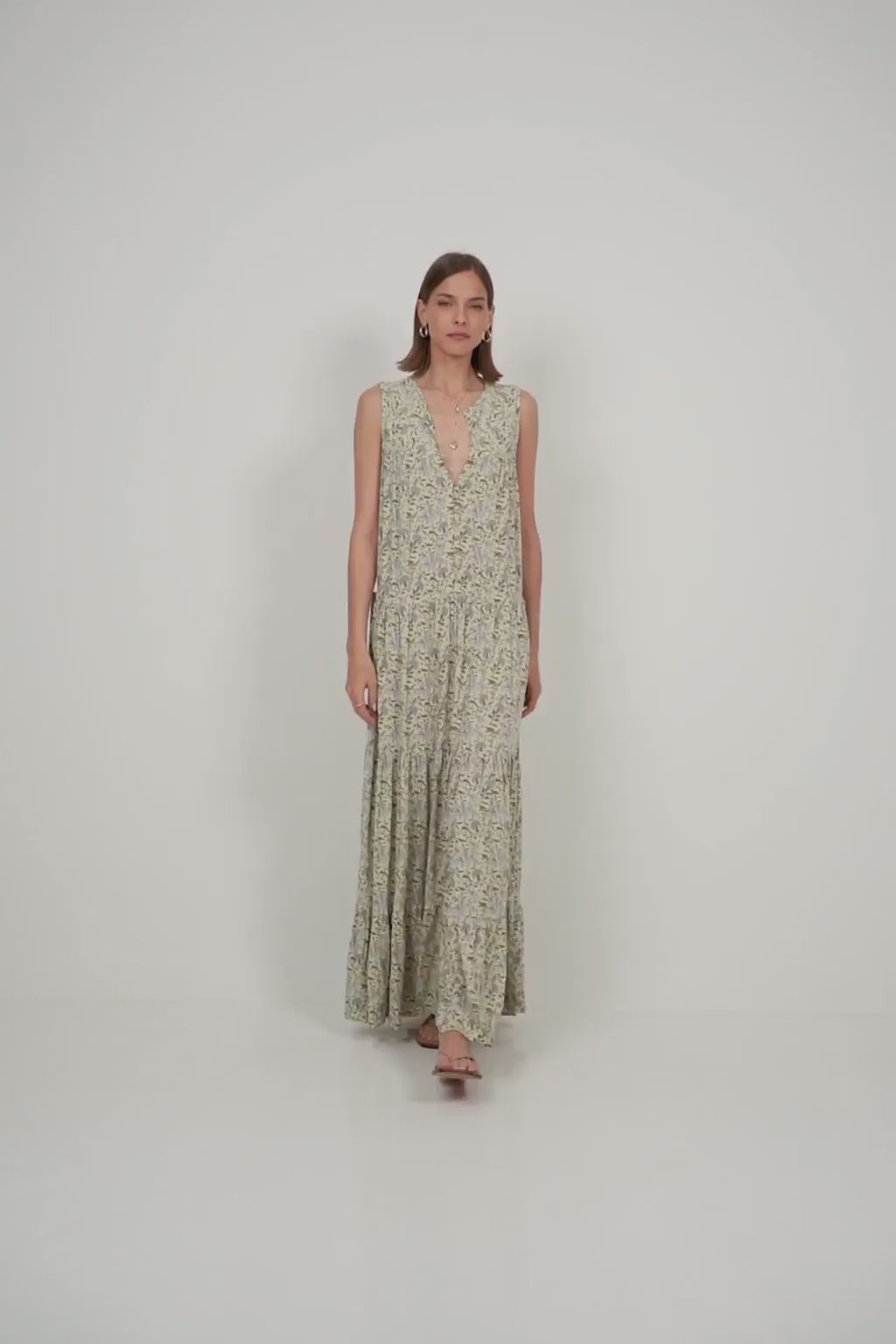 Model wears Floral maxi dress styled casually with sandals for everyday summer wear