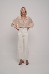 A model wearing a cotton summer pants molly cotton pant by Lilya