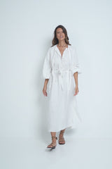A Model Wearing a White Maxi Shirt Dress with Removable Belt
