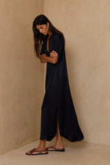 The short-sleeve midi satin shirt dress by LILYA. 