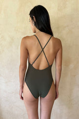 Minimal one piece swimwear with moderate bottom coverage 