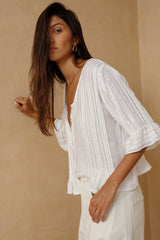 Side photo of the white summer relaxed top in soft rayon.